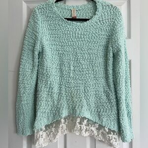 No Boundaries blue sweater. White lace on the bottom trim. Size XL.